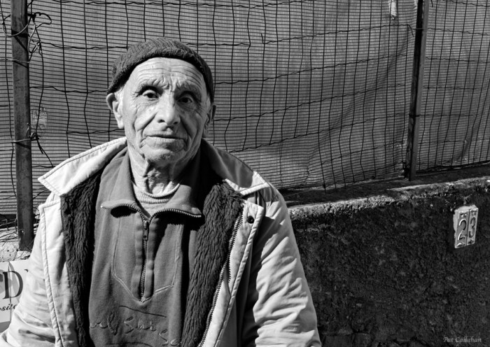 Old man poses for pictures in Nocelle Italy