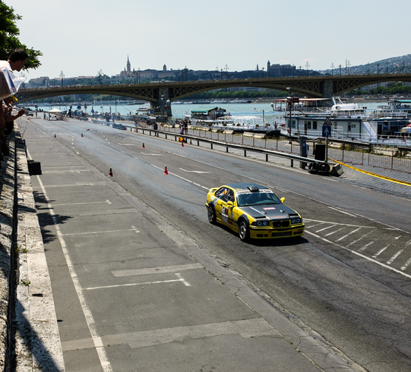 Street car racer dashing to the finish line