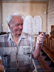 Barnabas feher with the key to the Mad Synagogue Hungary