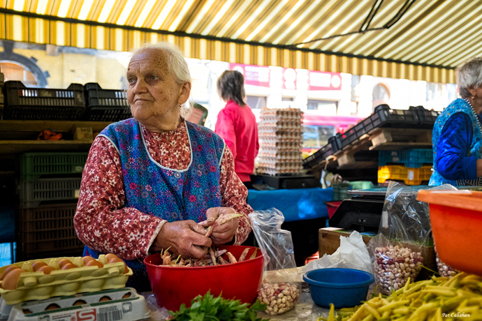 an old woman working at Hunyadi Ter market in Budapest